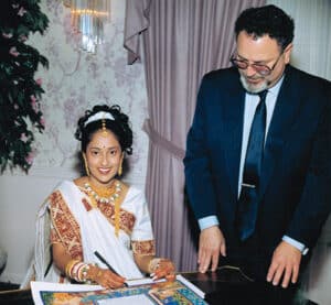 Bet Halevi, Dr. Genn and Bride, signing the Ketubah
